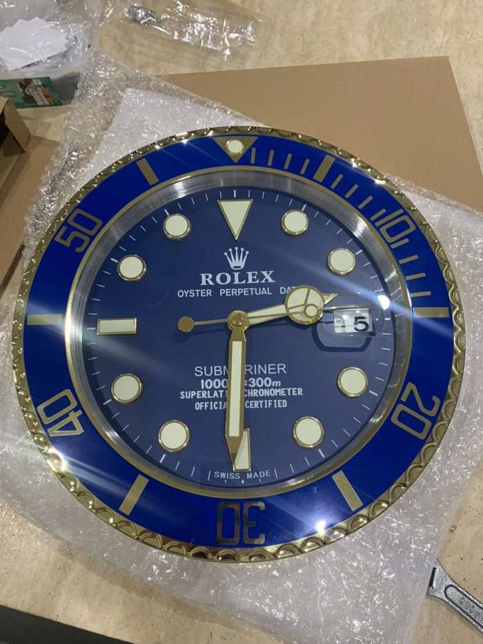 Luxurious submariner wall clock  in gold and blue bezel with blue face