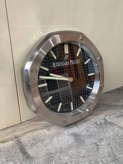 Luxurious stainless steel wall clock based on silver bezel and black face