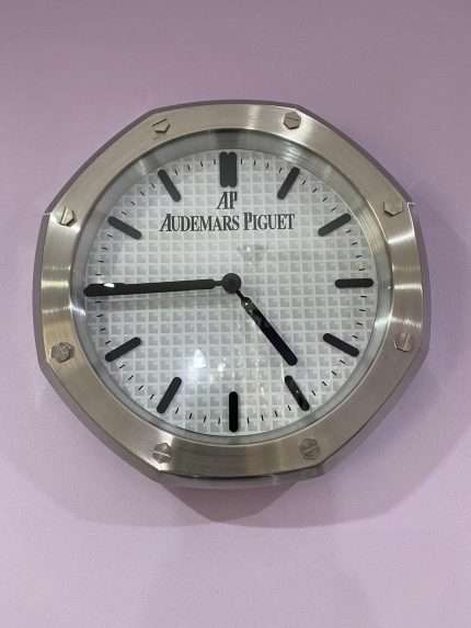 Luxurious stainless steel wall clock based on silver bezel and white face and black dial