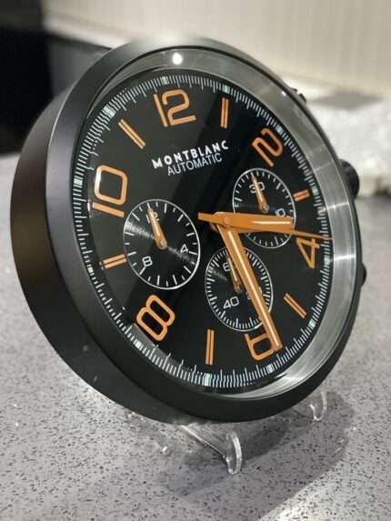 High-quality wall clock MONTBLANC with matt black bezel black face with orange dial