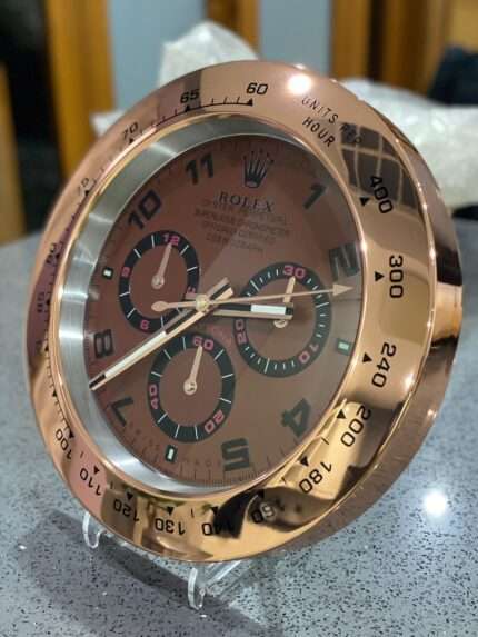 DAYTONA in rose gold bezel and brown face.