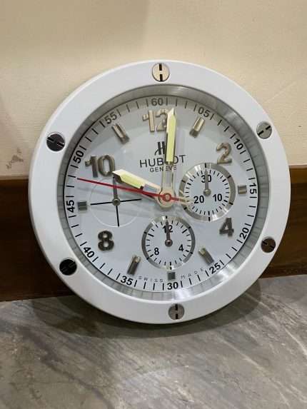 HOBLOT wall Clock Luxurious stainless steel with silver bezel and white face.