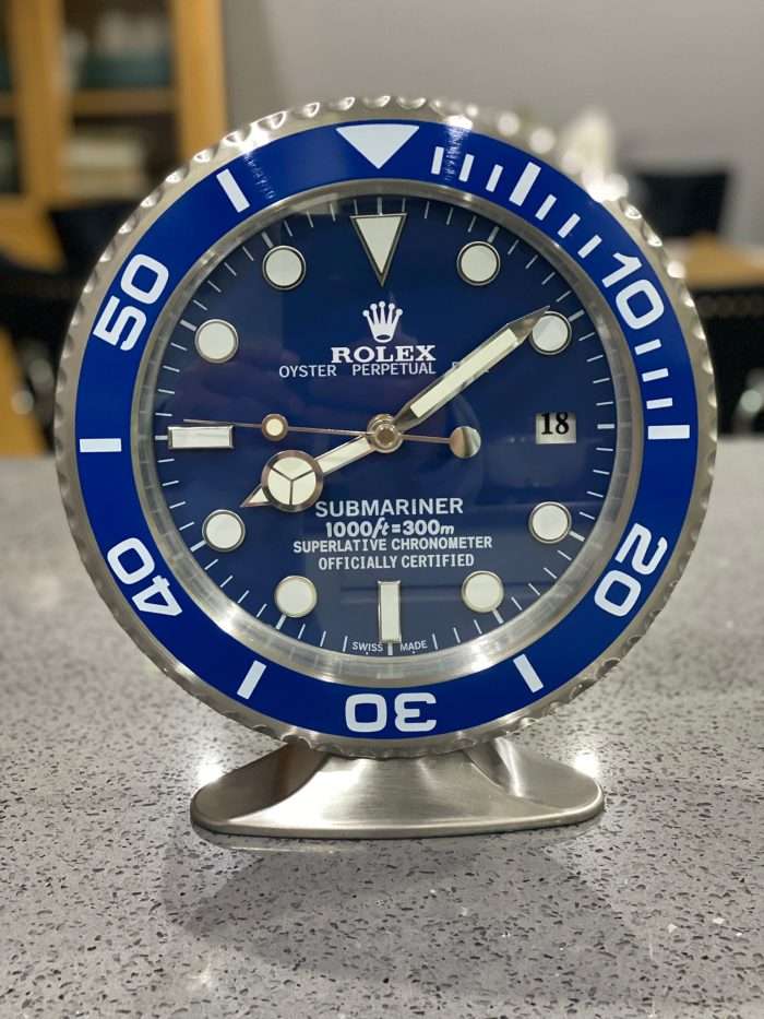 Submariner in blue bezel with blue face