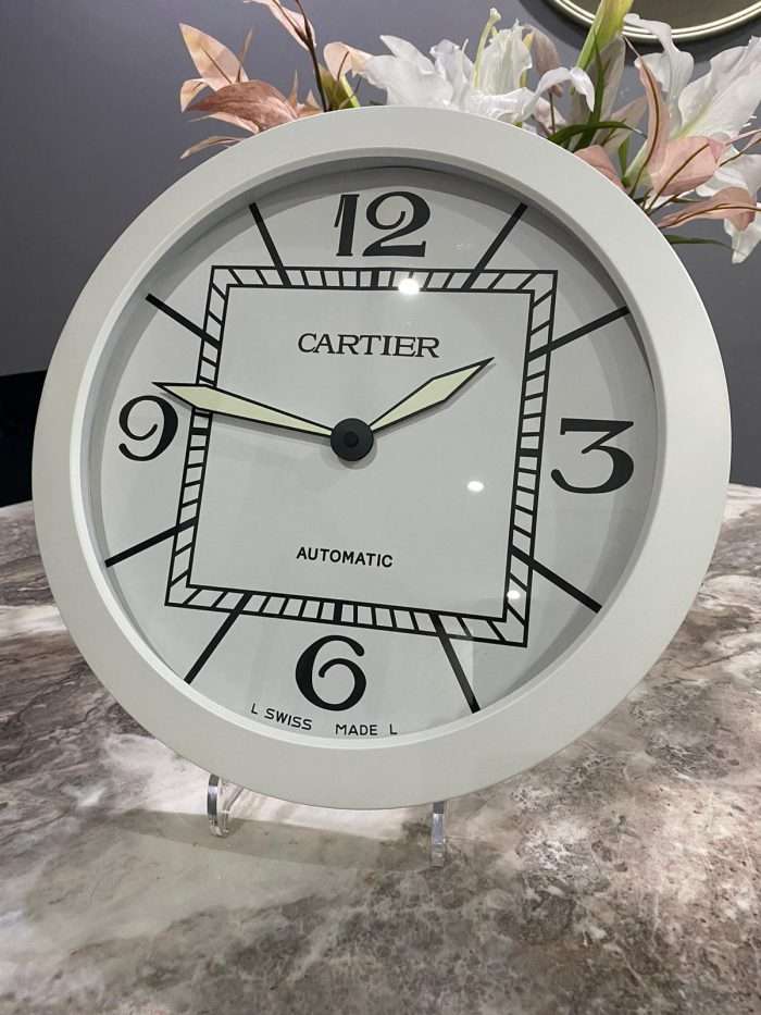 High-quality Cartier wall clock in White bezels and white face.