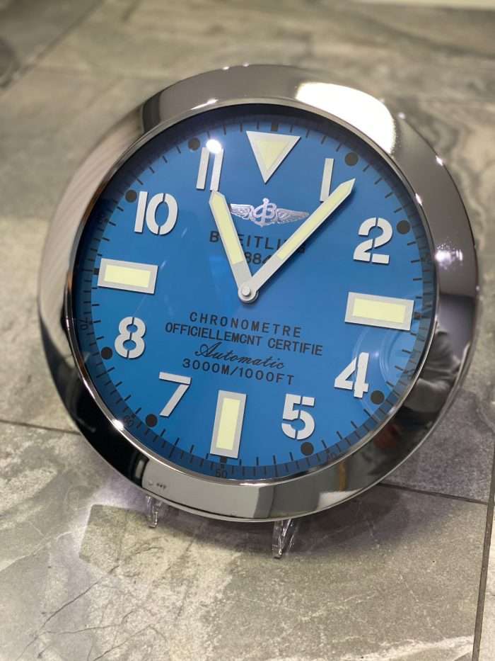 BREITLING wall clock based on silver bezel and blue face