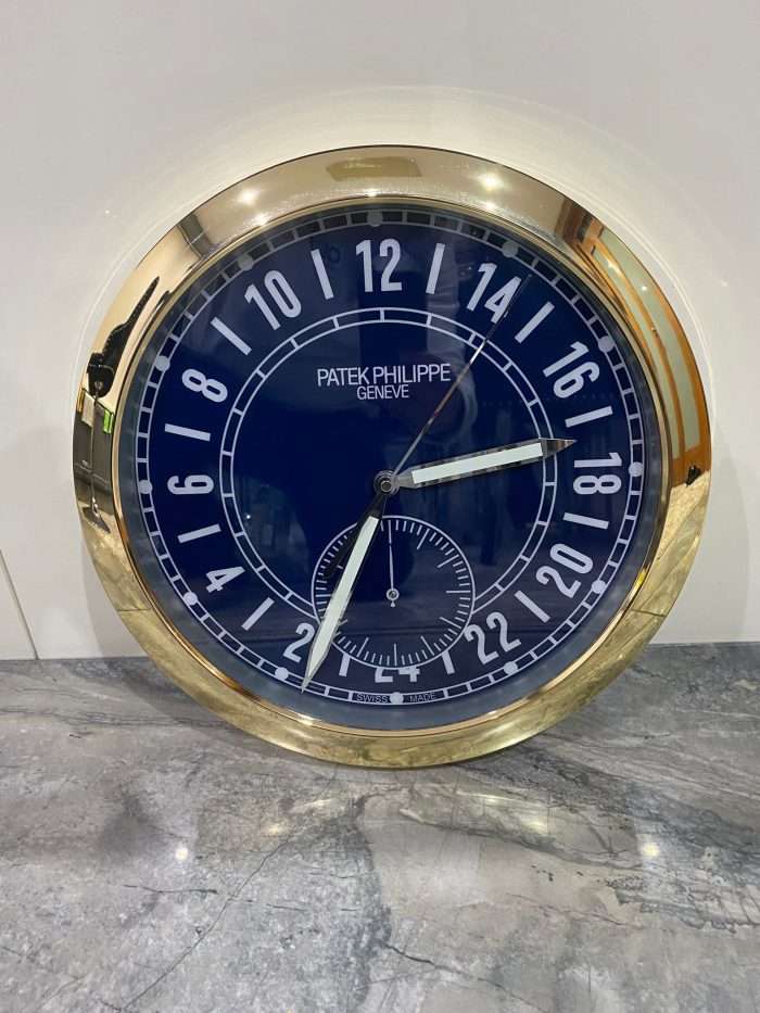 PATEK PHILIPPE Wall Clock | Yellow gold bezel and White face