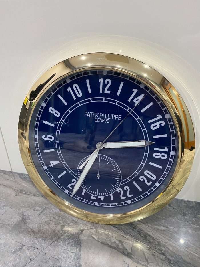 PATEK PHILIPPE Wall Clock | Yellow gold bezel and White face