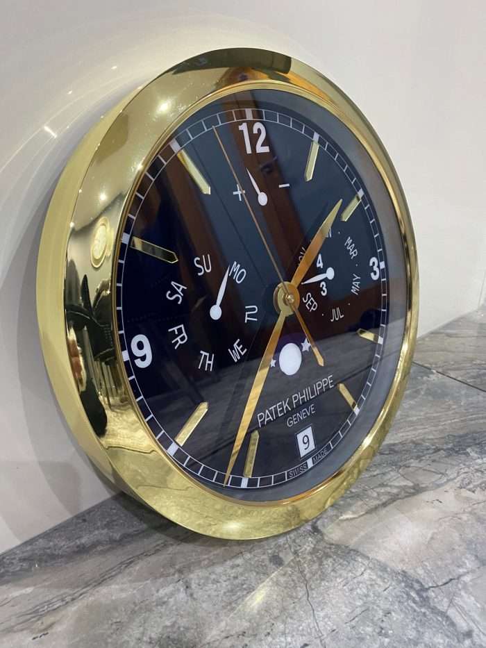 PATEK PHILIPPE Wall Clock | Yellow gold bezel and black face