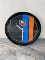 Luxurious wall clock TAG HEUER in black bezel with black face