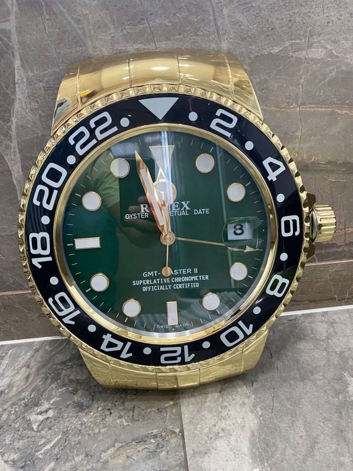 Rolex GM MASTER II stainless steel yellow gold – black bezel and green face.