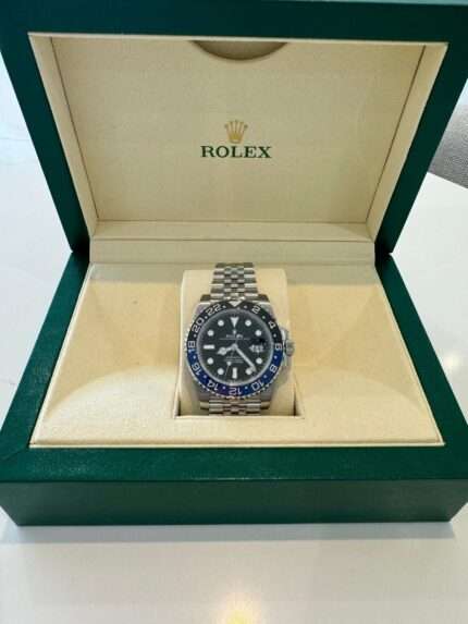 Rolex GMT-Master II Batman luxury watch displayed in premium Rolex presentation box with black dial and Jubilee bracelet